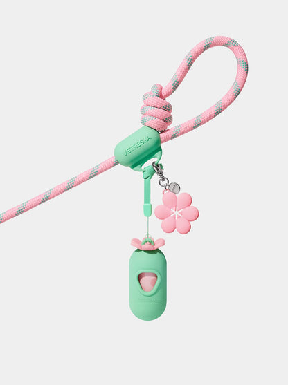 AURA Hands-Free Poop Bag Clip — MEADOW — in use