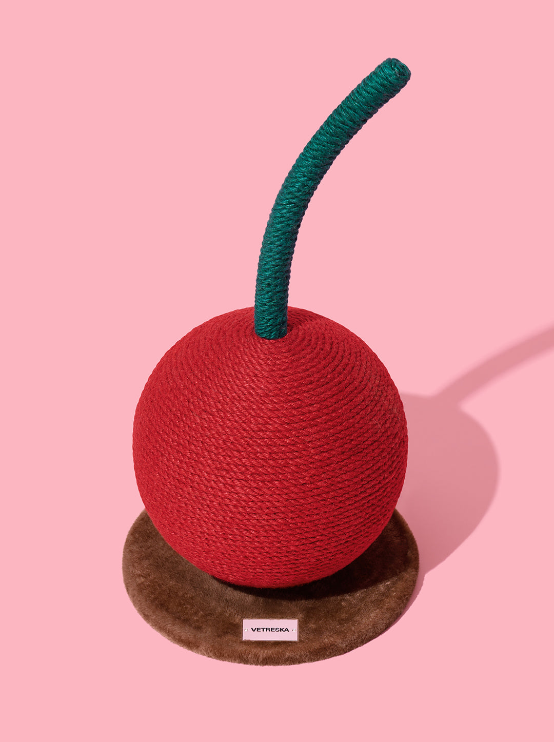 CERISE Cat Scratching Ball — styled in a home setting
