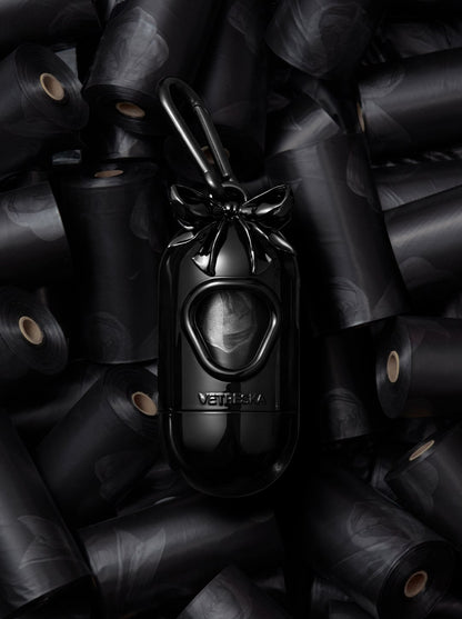 NOIR Pet Poop Bags & Dispenser Set — in use