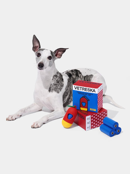 PRISM Poop Bags & Dispenser Set - Red — styled in a home setting